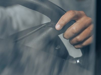 Close-up of hands in a calm, focused position.